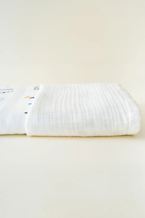 Couverture bébé motif nuages 90×110 cm