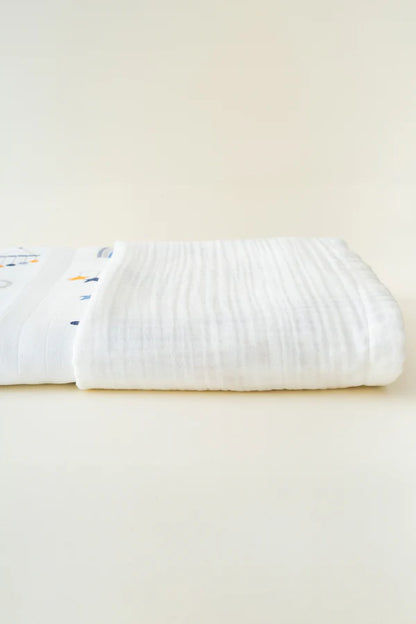 Couverture bébé motif nuages 90×110 cm